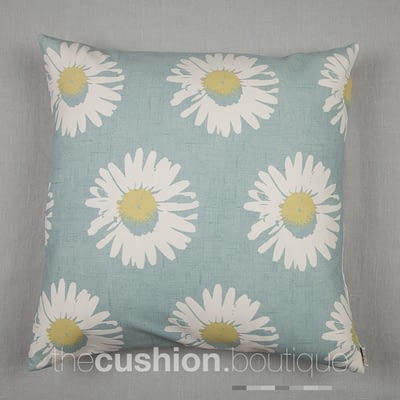 Large modern daisies on a chalky blue background
