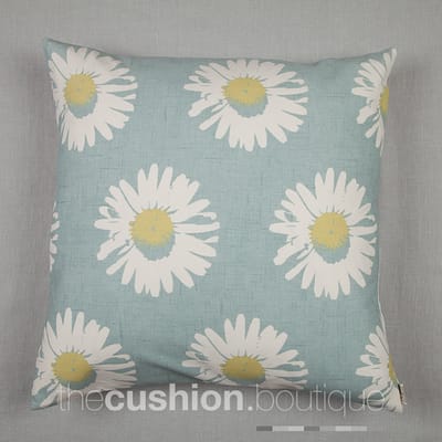 Large modern daisies on a chalky blue background