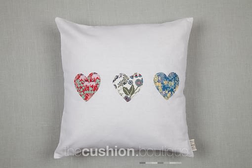 Classic white Linen handmade cushion embellished with Liberty print small hearts