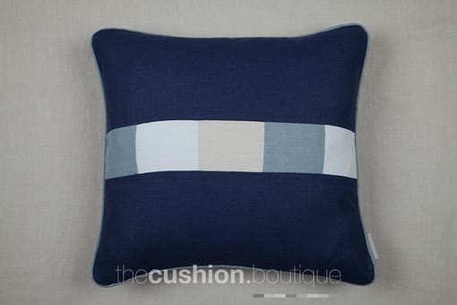 French Navy handmade linen cushion with patchwork central band in shades of blue & grey