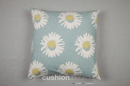 Large modern daisies on a chalky blue background