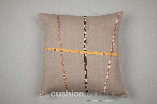 Contemporary linen handmade cushion with matchstick fabric inserts in retro fabrics