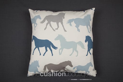 Rows of horses in shades of blue, grey & taupe on white