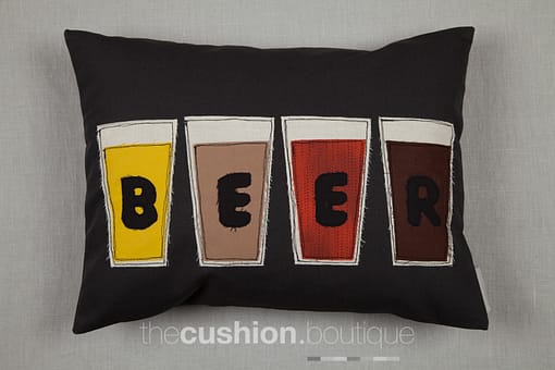 Handmade cushion featuring free machine embroidered Beer glasses