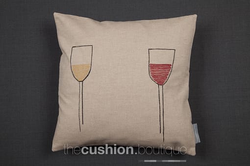 Handmade cushion featuring free machine embroidered red & white wine glasses