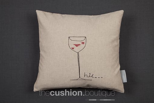 Handmade linen cushion featuring single wine glass in free machine embroidery