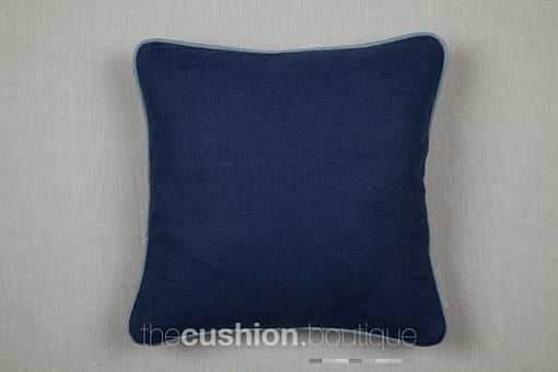 Classically elegant French Navy linen handmade cushion with blue piping detail